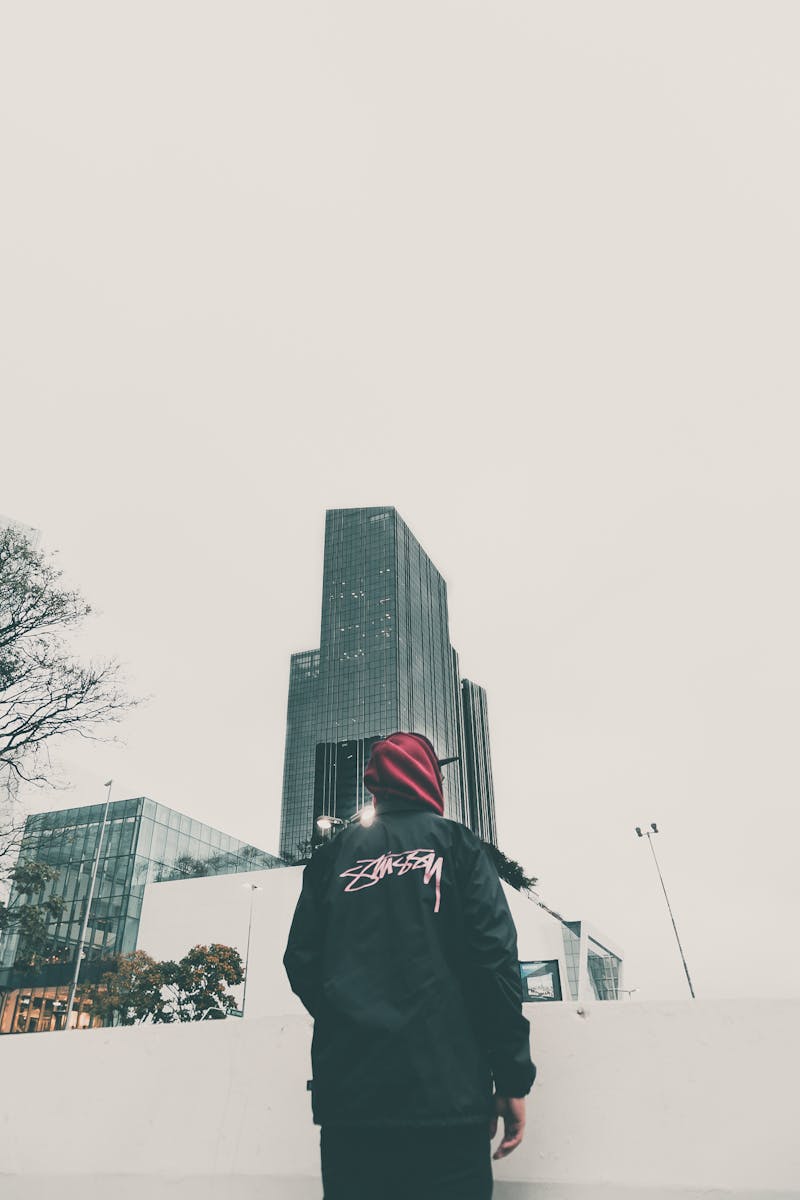 Man Staring at Skyscraper